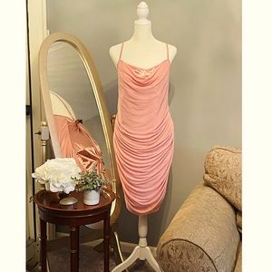 Spaghetti strap knee length pink dress with mesh front and silky back